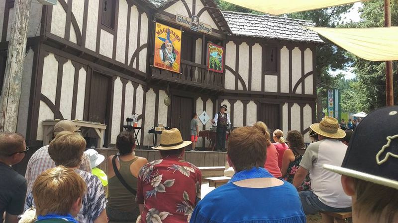 Audience watching a magician show at the Globe Stage at the Colorado Medieval Festival