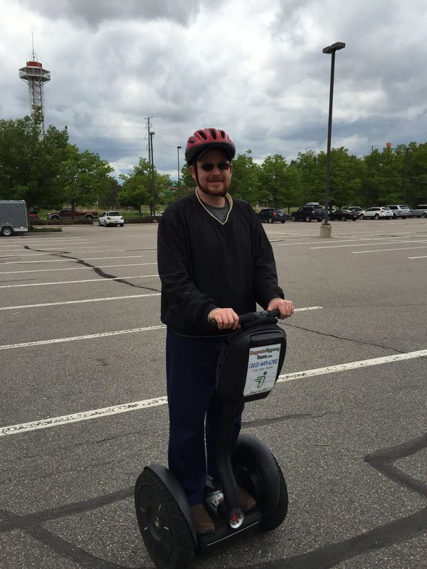 Robert Jenkins riding a Segway on a Segway tour in Denver, Colorado